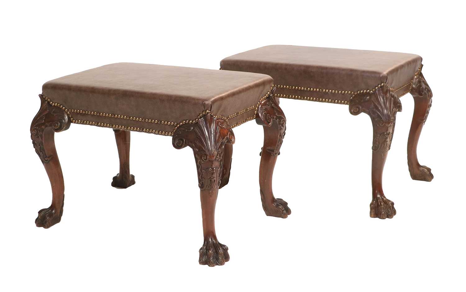 A Pair of Early 20th Century Carved Mahogany Dressing Stools, in George III style, covered in