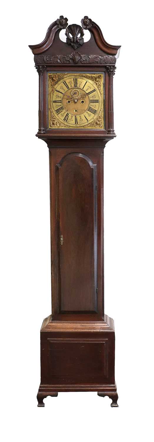 A Mahogany Eight Day Longcase Clock, swan neck pediment with carved borders, carved wooden