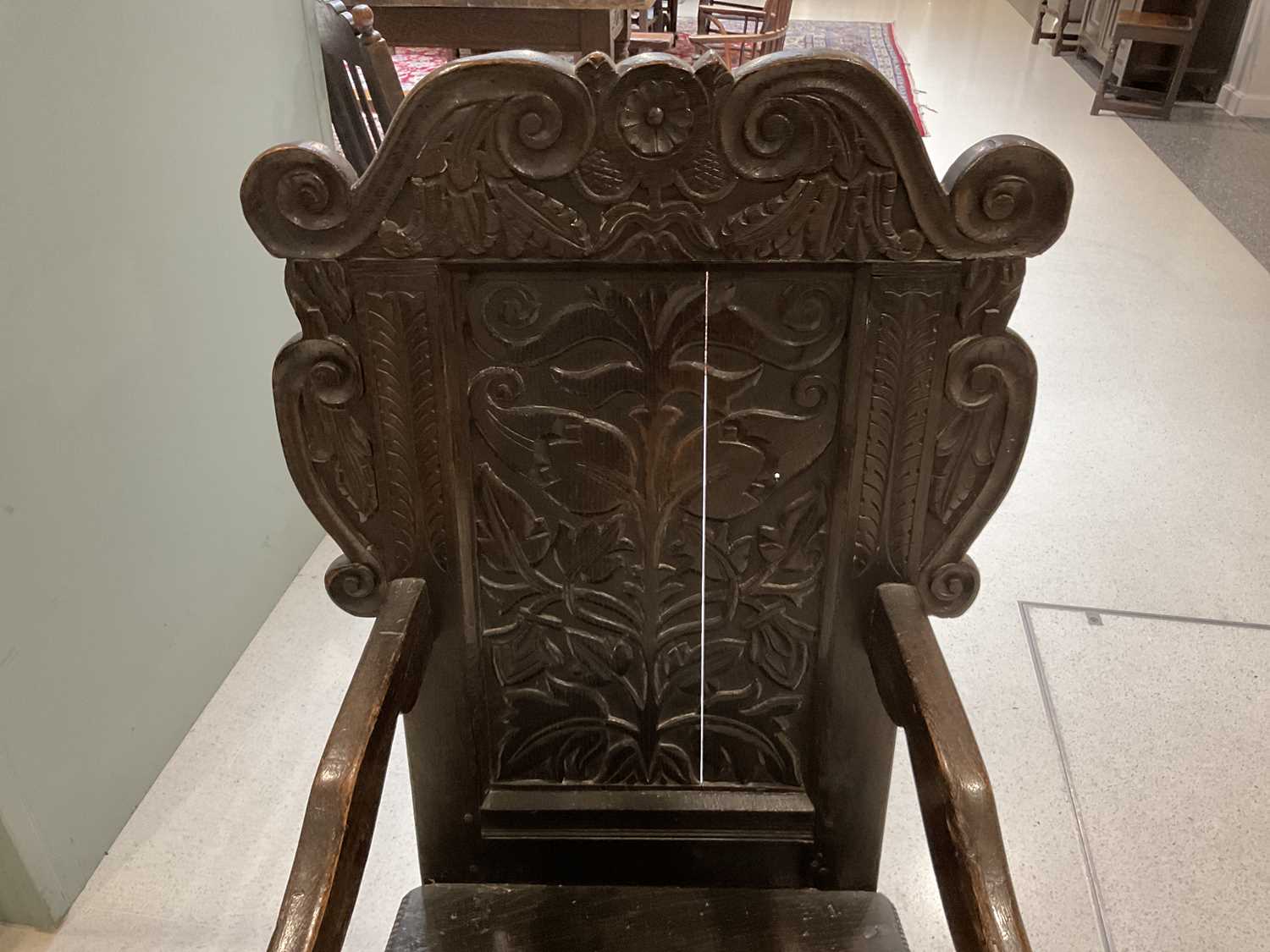 A Joined Oak Wainscot-Type Armchair, the carved top rail above a moulded back support carved with - Image 3 of 10