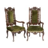 A Pair of 19th Century Carved Walnut Open Armchairs, recovered in green velvet, with padded back