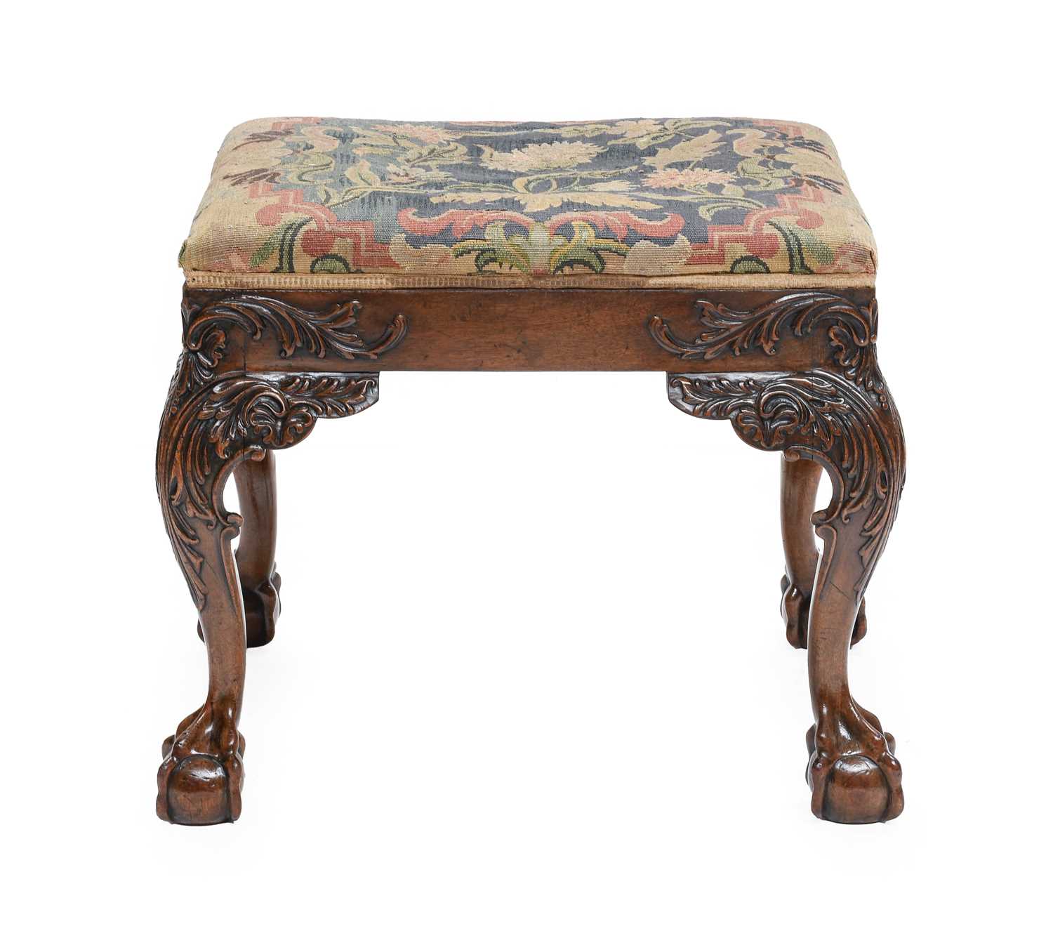 A George III Carved Mahogany Dressing Stool, late 18th century, covered in floral needlework, with