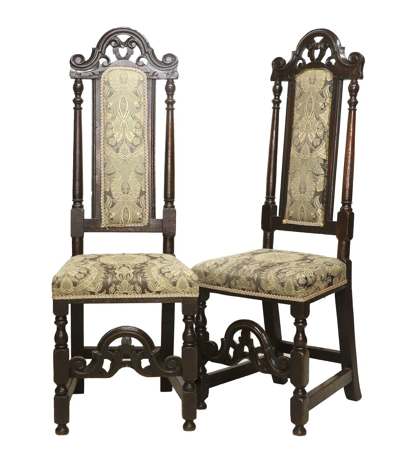 A Pair of Late 17th Century Carved Oak Back Stools, recovered in modern grey and cream paisley