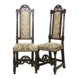 A Pair of Late 17th Century Carved Oak Back Stools, recovered in modern grey and cream paisley