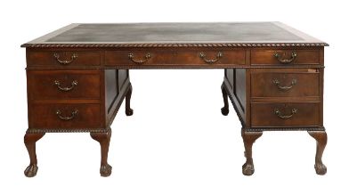 A George III-Style Carved Mahogany Double Pedestal Desk, stamped Marsh, Jones & Cribbs of Leeds,