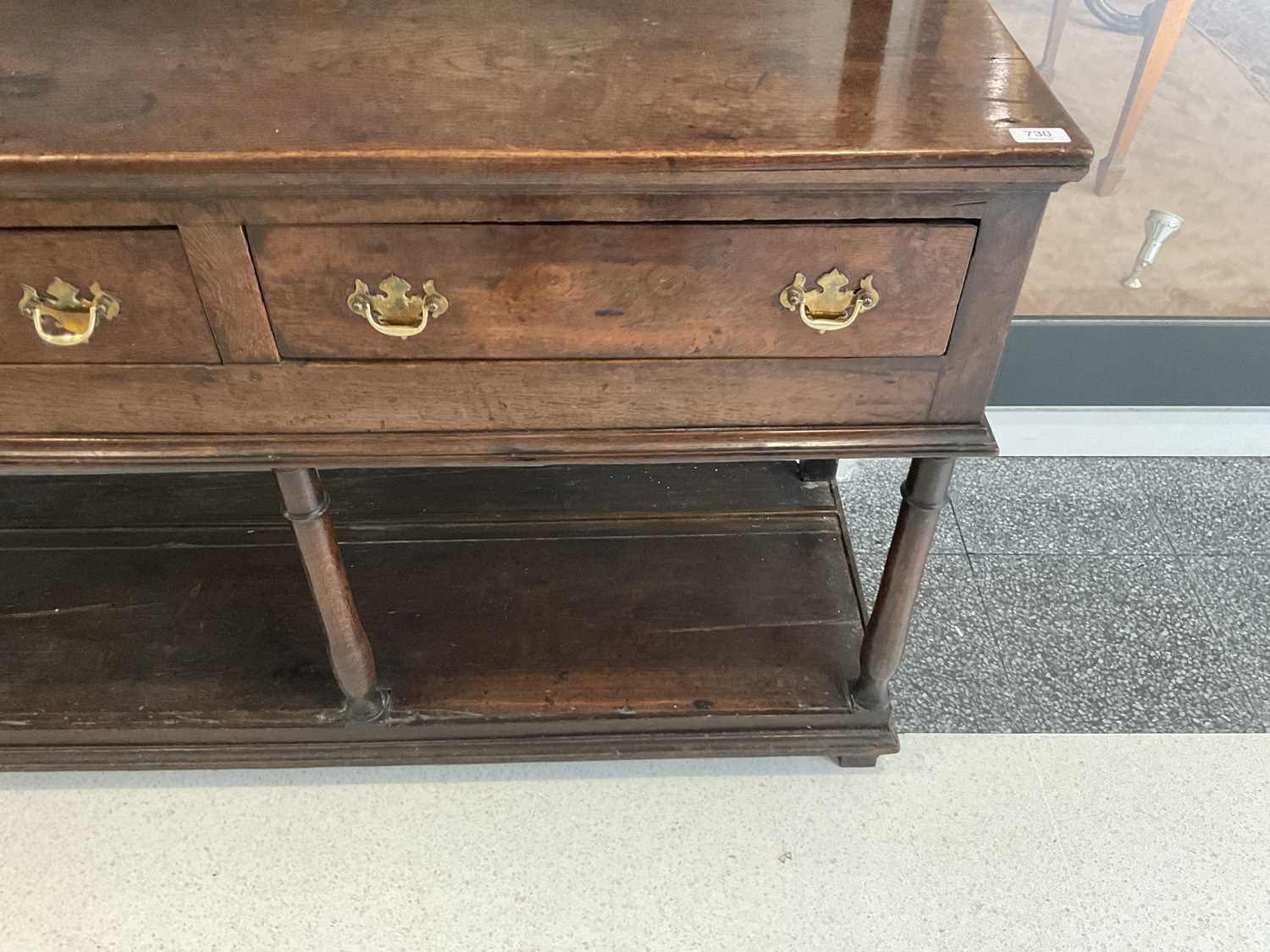 A George III Oak Dresser and Rack, 3rd quarter 18th century, the moulded cornice above iron cup - Image 3 of 15