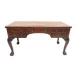 Holland & Sons: A Victorian Carved-Mahogany Library Writing Table, 2nd half 19th century, the