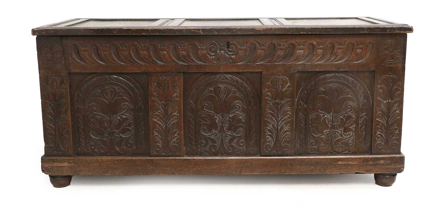 A Late 17th Century Joined Oak Chest, the hinged lid with three moulded panels enclosing a vacant