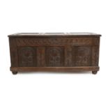 A Late 17th Century Joined Oak Chest, the hinged lid with three moulded panels enclosing a vacant