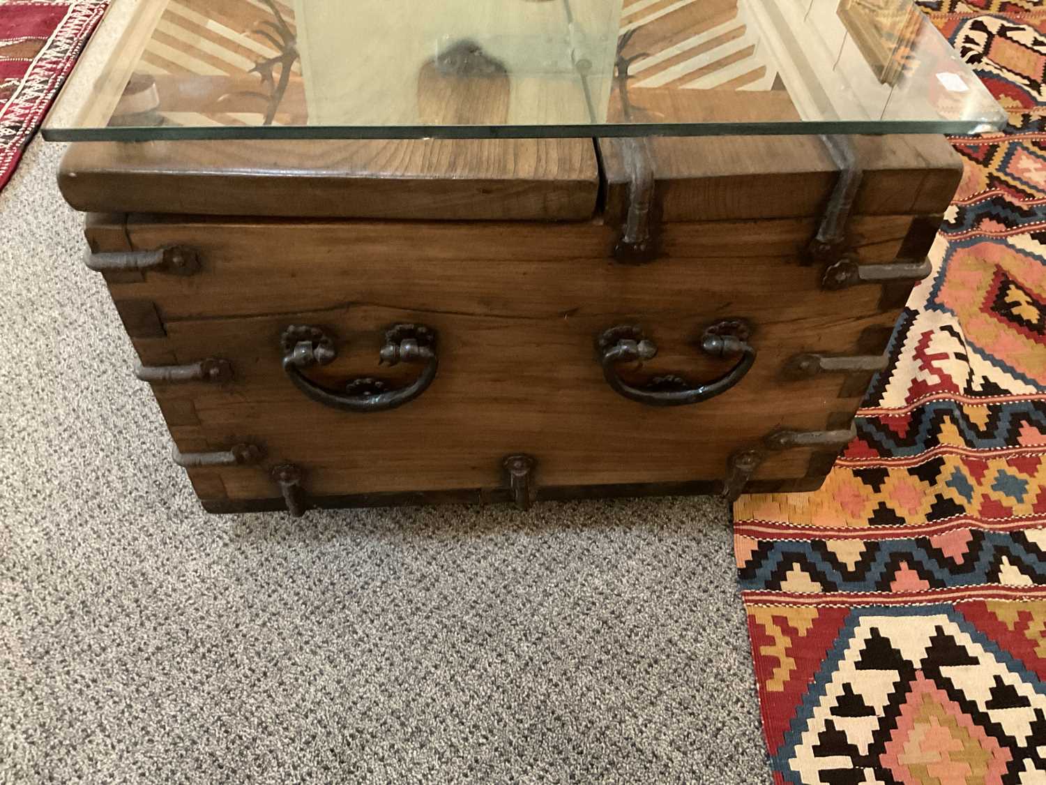 A Japanese Hardwood and Iron-Bound Trunk, modern, used as a coffee table with later glass top, the - Image 6 of 8