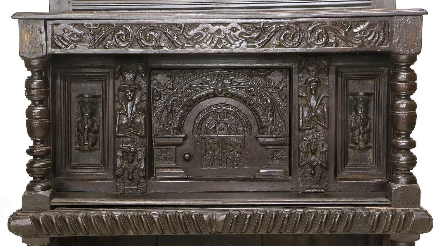 A Late 16th Century Carved Oak Livery Cupboard, initialled MHN and dated 1597, the superstructure - Image 2 of 2