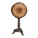 A Late 19th/Early 20th Century Anglo-Indian Carved Bombay Wood Tripod Table, the circular top