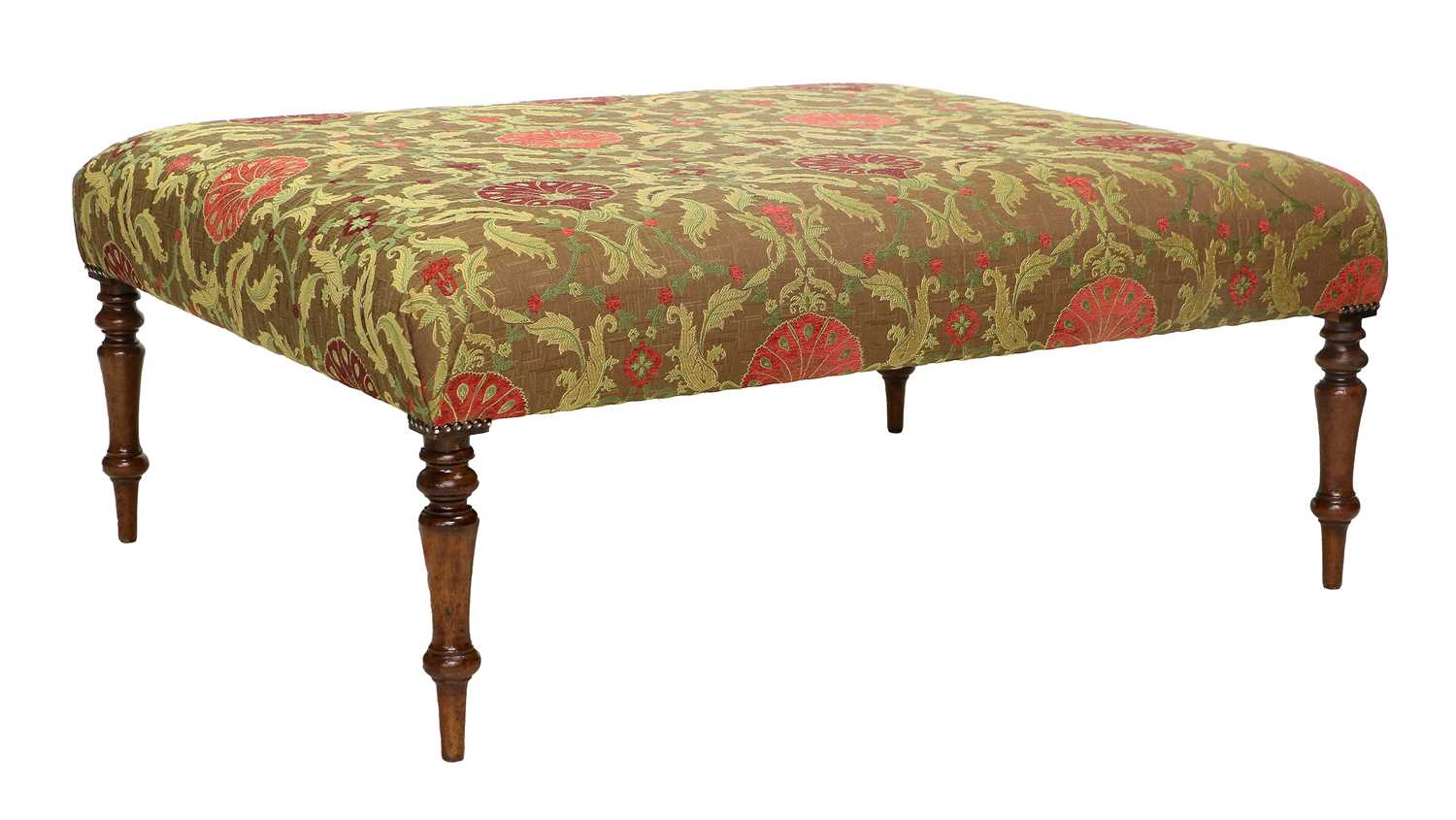 A Victorian-Style Oversized Footstool, recovered in modern red, green and gold fabric, on mahogany