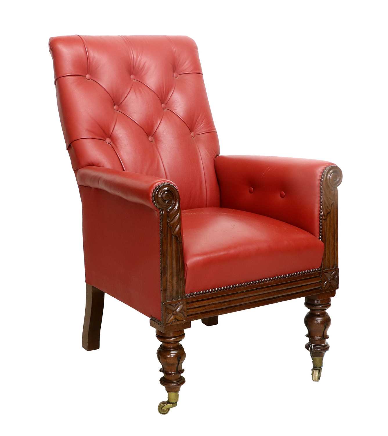 A William IV Carved Mahogany Library Armchair, 2nd quarter 19th century, recovered in close-nailed