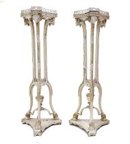 A Pair of Late 19th/Early 20th Century Adam Style Cream Painted and Parcel Gilt Torcheres, the