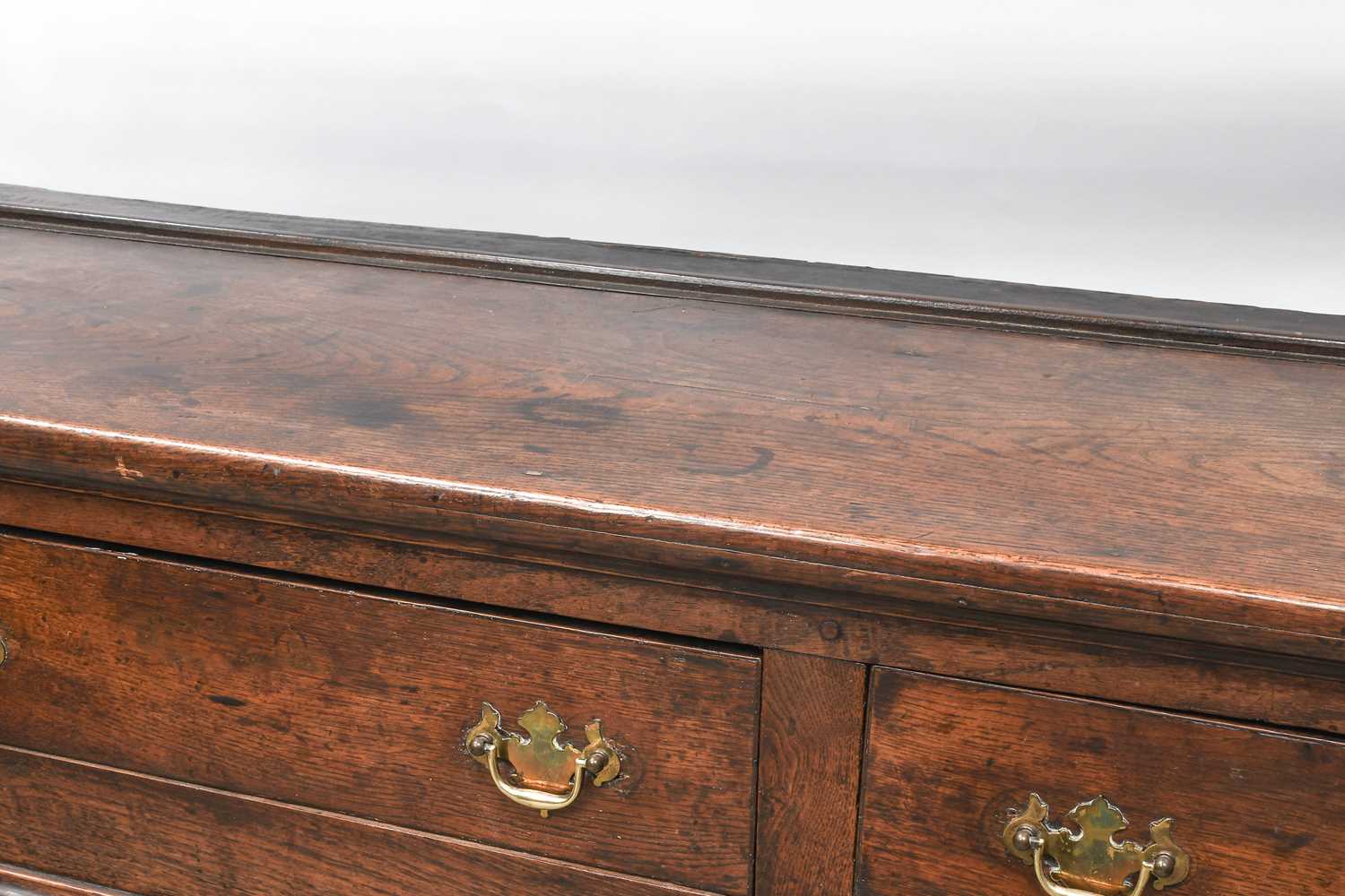 A George III Oak Dresser and Rack, 3rd quarter 18th century, the moulded cornice above iron cup - Bild 2 aus 15