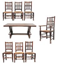 A Solid Oak Refectory-Style Dining Table, 20th century, the rectangular top above trestle end