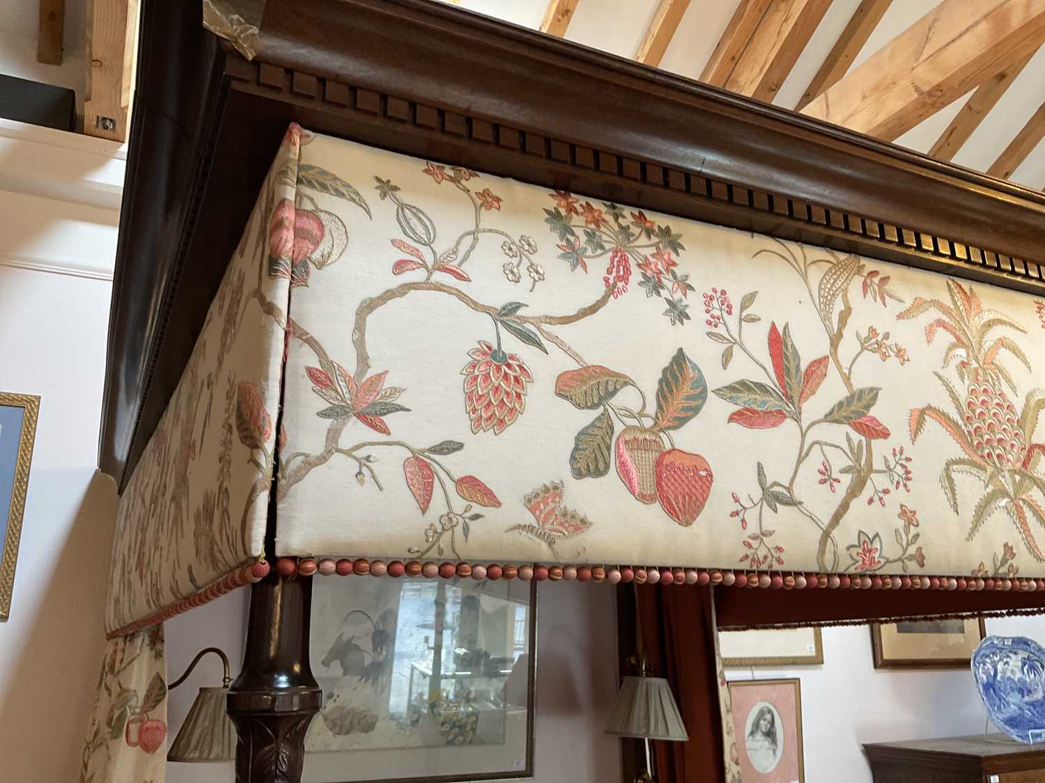 A George III-Style Carved Mahogany Four-Poster Bed, 19th century in part, with later cream crewel- - Image 6 of 13