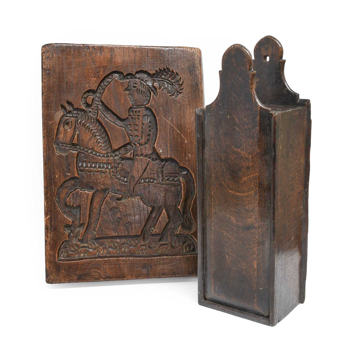 An Elm Double-Sided Gingerbread Mould, 18th century, carved with a knight on horseback and a sailing