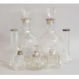 Two Silver Mounted Decanters, three silver mounted dressing table bottles and a pair of vases