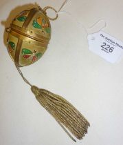 An egg form sewing etui, containing original gilt thimble, ribbon threader, needle case,