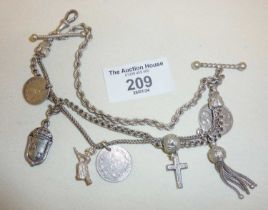 Antique silver bracelet made from albertina watch chains and hung with silver charms, fob medals and