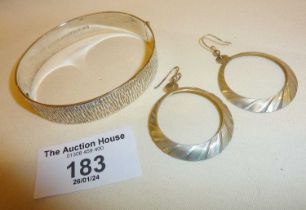 Vintage modernist hallmarked silver bracelet with bark-effect texture and a pair of silver earrings,