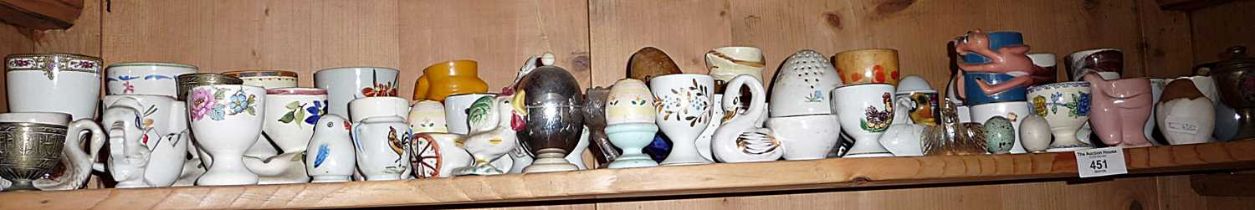 Large quantity of egg cups (one shelf)