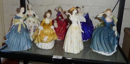 Eight various Royal Doulton porcelain lady figurines