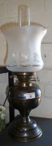 Brass oil lamp with etched glass shade