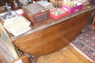 19th c. large oval oak farmhouse wake/gateleg table on bold turned legs with two drawers, 59" wide x