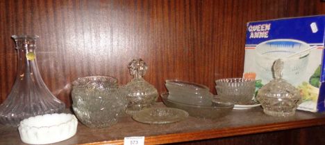 A shelf of assorted cut glass