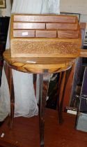 African zebrawood wine table on four legs, and an Indian carved wood stationery rack