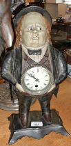 Painted metal Novelty figurative mantle clock in the form of a Victorian man with moving eyes (in