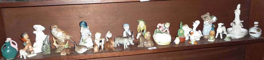 Collection of china animal ornaments (one shelf)