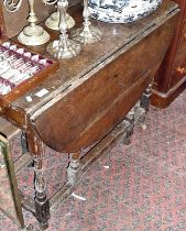 18th c. oak gateleg table on turned legs with drawer