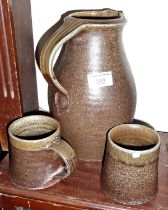 Studio pottery: Stoneware jug and two mugs