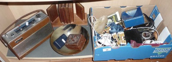 Shelf of miscellaneous items including Roberts R505 radio, and wooden bookends etc