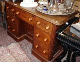 Victorian pine kneehole desk of 7 drawers flanking a cupboard and having a mahogany top 4' wide x 2'