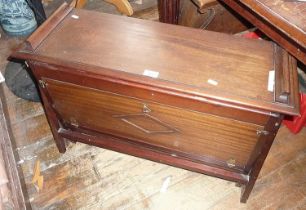 Early 20th c. mahogany campaign extending camp bed with panelled front and bench top