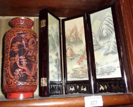 Oriental carved cinnabar-style vase and a Chinese four-fold table screen
