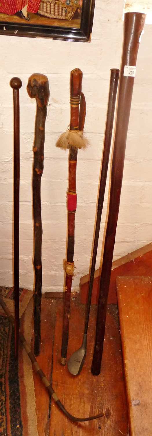 Tribal Art: hardwood walking stick club, three other sticks, etc.