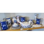 Collection of assorted blue & white china including graduated set of three Flo-blue jugs (A/F),