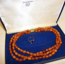 Vintage amber triple strand necklace and a silver ring
