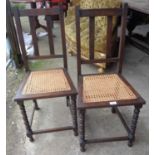 Pair of bobbin turned cane seated oak side chairs