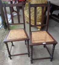 Pair of bobbin turned cane seated oak side chairs