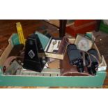 Box of interesting items, inc. Victorian leather jewellery boxes, metronome, binoculars etc.