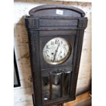 Oak cased 8-day wall clock, striking on a gong with glass door enclosing pendulum