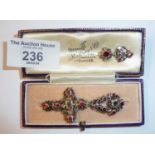 Georgian crucifix pendant set with rose cut diamonds and garnets, together with another smaller