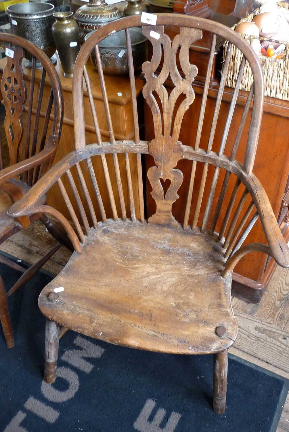 Early 19th c. ash and elm Windsor armchair (spindle missing)