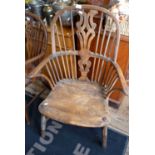 Early 19th c. ash and elm Windsor armchair (spindle missing)